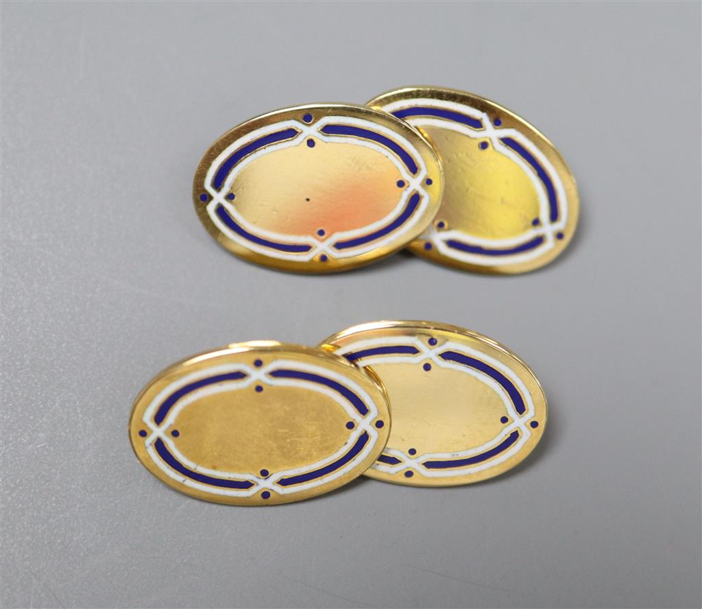 A pair of George V 18ct gold and two colour enamel oval cufflinks,